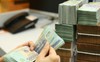Vì sao doanh nghiệp ồ ạt xuống tiền mua lại trái phiếu trước hạn?