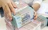 NHNN ưu tiên nới room tín dụng cho ngân hàng có thanh khoản tốt, nhà băng nào có lợi thế?