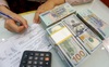 Mỹ thắt chặt tiền tệ có thể ảnh hưởng tiêu cực tới giá trị VND, nhưng Việt Nam đã có 3 yếu tố thuận lợi để ổn định