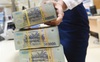 Ngân hàng đầu tiên báo cáo lợi nhuận năm 2021 tăng trưởng âm