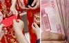 Trung Quốc: Trộm tiền của chú rể để... làm quà tặng nạn nhân