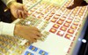 Giá vàng vẫn chịu sức ép từ lạm phát