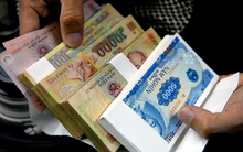 Sôi động dịch vụ đổi tiền lẻ, tiền mới