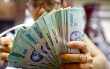 Ngân hàng ngoại nói gì về quyết định phá giá VND?