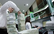 Chao đảo vì tác động của tỷ giá