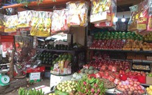 [Ảnh] Người dân Hà Nội sắm đồ cúng ông Công ông Táo sớm