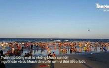 Nắng nóng đỉnh điểm, biển Đà Nẵng đông nghịt người giải nhiệt