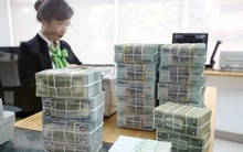 Vì sao các ngân hàng ồ ạt mua lại nợ xấu?