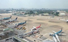 Những Bộ nào chịu trách nhiệm triển khai điều chỉnh quy hoạch mở rộng sân bay Tân Sơn Nhất?