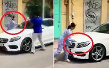 Vụ người phụ nữ đập xe ở quận 1: Đậu ôtô trước nhà phố đúng hay sai?