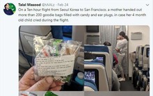 Cho con 4 tháng tuổi đi máy bay, bà mẹ gửi kẹo và bịt tai cho 200 hành khách nhưng đáng chú ý là tờ giấy đính kèm