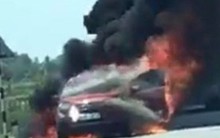 Xế hộp do 1 phụ nữ điều khiển đang chạy bỗng bốc cháy ngùn ngụt