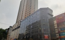 Cao ốc 15 năm không xong, lại 'tranh nhau' bán căn hộ