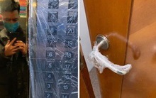 Chung cư Hà Nội thi nhau 'dùng chiêu' bọc nilon chống dịch corona