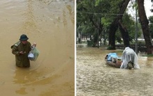 Thầy Hiệu trưởng chèo đò, lội nước mang cơm cho sinh viên đang sống giữa tâm lũ