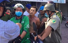 Bắt giữ thanh niên tẩm xăng cướp ngân hàng ở TP.HCM