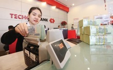 Ngân hàng báo lãi, tiếp tục gỡ khó chính sách trong việc xử lý nợ xấu