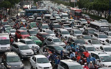 Nóng: Tái khởi động thu phí ô tô vào trung tâm TPHCM