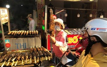 Phố cá lóc nướng ở TPHCM 'cháy hàng' ngày vía Thần tài