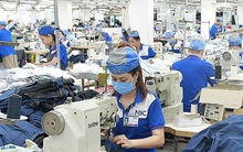 Tiến độ tiêm vaccine có thể hãm đà tăng xuất khẩu dệt may