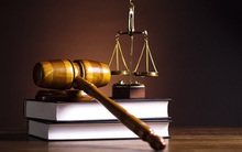 Tội vu khống, bịa đặt, bôi nhọ danh dự người khác có thể bị xử phạt đến 7 năm tù giam và bồi thường đến 10 tháng lương