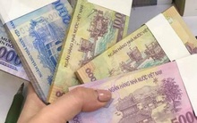 Đổi tiền mới dịp tết, còn cần thiết không?