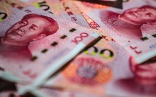 Nhân dân tệ lao dốc mạnh sau khi PBOC đặt tỷ giá tham chiếu ở mức thấp nhất 14 năm