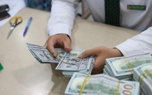 Ngân hàng Nhà nước giảm giá bán USD lần thứ 3 trong tháng