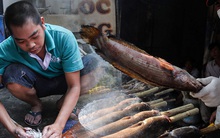 Ảnh, clip: Tiểu thương Sài Gòn tất bật chuẩn bị hàng chục ngàn con cá lóc nướng cho ngày vía Thần Tài