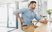 Ngồi 8 tiếng một ngày, dân công sở than trời vì đau lưng: CẢNH BÁO căn bệnh khiến cột sống có nguy cơ bị LIỆT TÀN PHẾ hoặc TEO CƠ CHI suốt đời