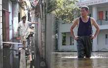 Nước ngập cả tuần, hàng trăm hộ dân giữa thủ đô bắc cầu khỉ để di chuyển