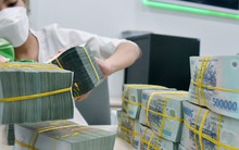 Ngân hàng trầy trật với nợ xấu