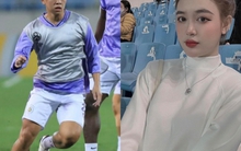 Vợ trung vệ U23 Việt Nam xinh như búp bê trên khán đài sân Mỹ Đình