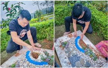 Khoảnh khắc bố cặm cụi trang trí ngôi mộ cho con gái nhỏ đã qua đời gây xúc động: “Bố không phải họa sĩ, nhưng bố có thể làm tất cả vì con”
