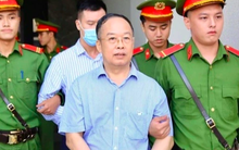 Bản cung thể hiện cựu Cục phó Quản lý xuất nhập cảnh chỉ đạo nhận, chia tiền biếu xén