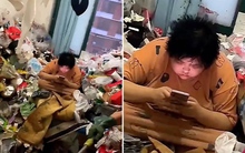 Cảnh sống 'ăn lông ở lỗ' của cô gái trong căn hộ thối hoắc, rác chất lên tận cửa sổ