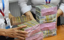 Tìm thuốc chữa bệnh "ngân hàng thừa tiền"