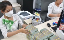 Đẩy nhanh vốn tín dụng ra thị trường