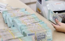 Khách chật vật  vay vốn để đảo nợ, ngân hàng khó chữa bệnh 'thừa tiền'?