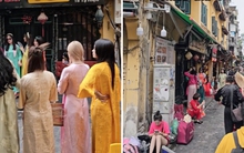 MXH nổ ra tranh cãi về trend chụp ảnh áo dài Tết: Buộc khăn, đeo kính đen và những cách tạo dáng gây khó chịu?