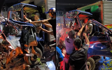 TP.HCM: Người dân góp sức cứu 2 vợ chồng tài xế bị mắc kẹt trong đầu xe tải bẹp dúm