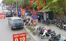 Bãi xe quanh Bệnh viện K Tân Triều trưng biển 'có phép' nhưng thu phí 'vô phép'