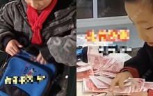 Cậu bé mang 900 triệu lì xì đi tặng cả lớp, cô giáo hốt hoảng báo phụ huynh và phát hiện một bí mật
