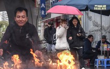 Nhịp sống người dân Thủ đô trong những ngày mưa rét dị thường