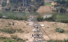 Sập cầu treo dài hàng trăm mét bắc qua sông