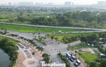 Đường dẫn cầu Trần Hưng Đạo hiện hình hài và bắt đầu vượt đê ra sông