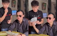 Nam NSƯT từ Mỹ về, cầm một sấp tiền USD cho cháu dâu