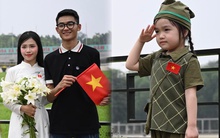 Hàng ngàn người đổ về Quảng trường Ba Đình "check-in" trước thềm đại lễ 30/4: Áo dài, cờ đỏ rực rỡ cả góc trời Hà Nội