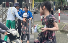 Em gái lớp 2 ngồi cổng trường thi đợi anh trai gây sốt mạng