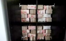 Đột kích căn hộ của nữ CEO công ty mỹ phẩm, tịch thu hơn 734 tỷ đồng tiền mặt chất đống như núi, phải dùng 3 xe tải bọc thép mới chở hết